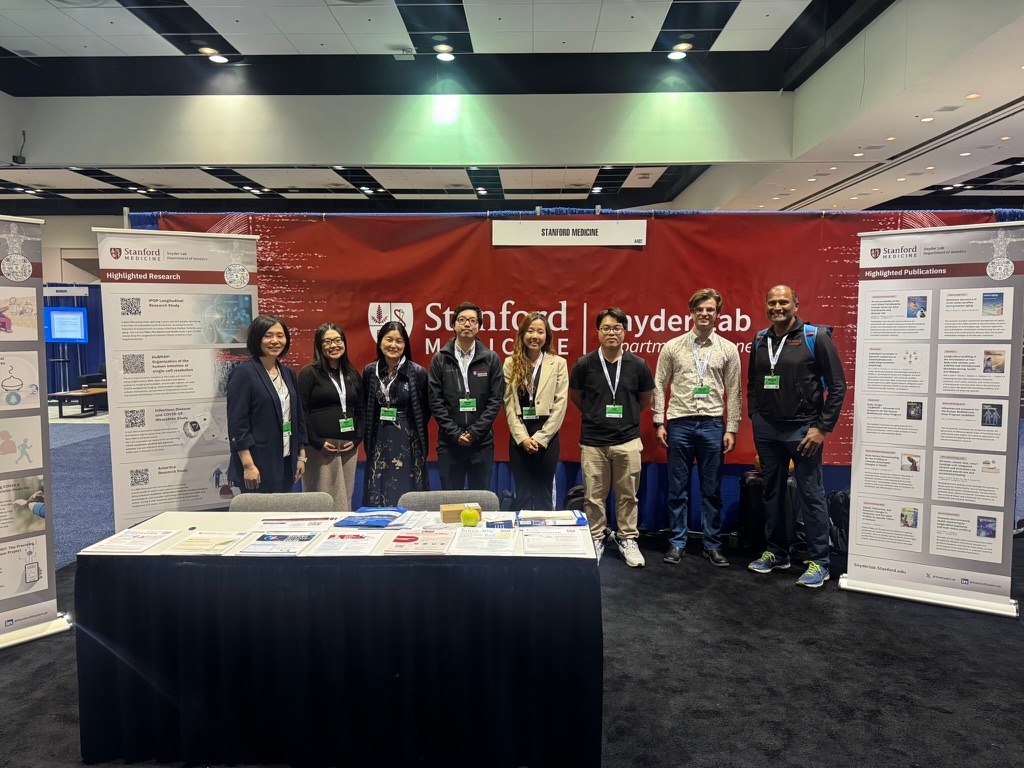 Viktor Minchev with the Snyder Lab team at the Stanford Medicine booth at PMWC 2026